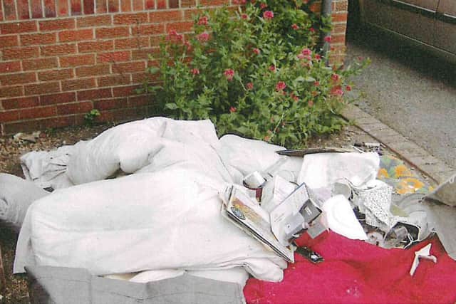 Items dumped by Michael Peter Hutchinson, most recently living at Church Lane, Croft, Skegness, in his ex-wife's front garden. EMN-160120-132713001