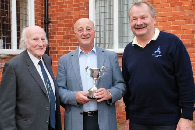 From left, former seniors captain Peter Cunnington with stableford winner Graham Cowley and current seniors skipper Roger Culpin EMN-160125-152655002