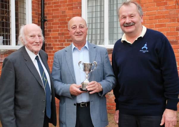 From left, former seniors captain Peter Cunnington with stableford winner Graham Cowley and current seniors skipper Roger Culpin EMN-160125-152655002