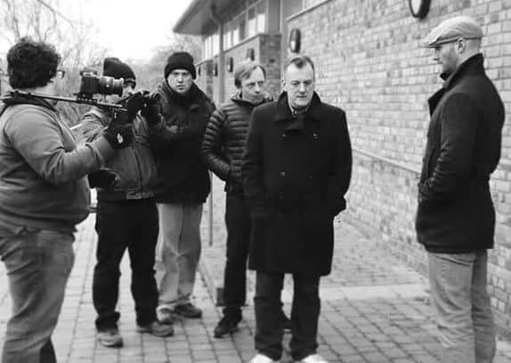 James Hodcroft (right) on the set of Essex Boys: Law of Survival - on which he was one of the actors.