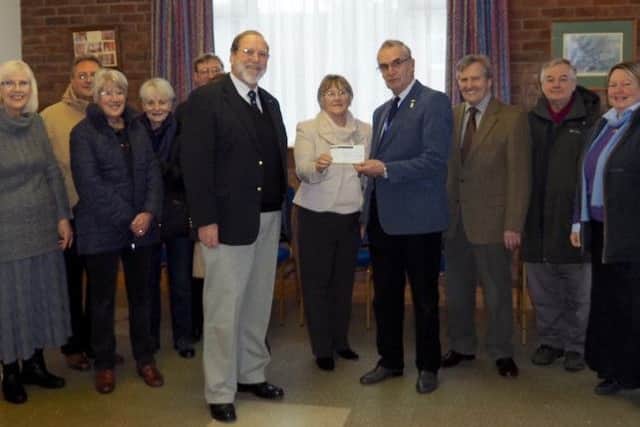 VOCAT present a cheque to the Lincolnshire Air Ambulance EMN-160129-130349001