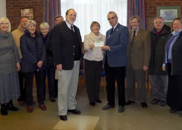 VOCAT present a cheque to the Lincolnshire Air Ambulance EMN-160129-130349001