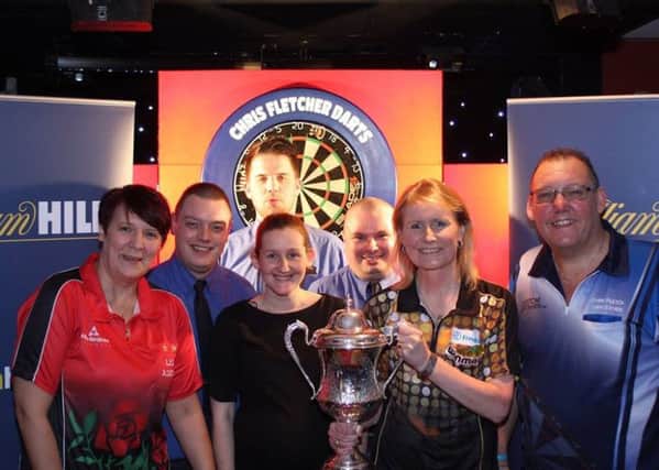 Trina Gulliver and Lisa Ashton pose with the William Hill team of Chris Butler, Liam Simms, Cyd Fowell, Jamie Cooper and event organiser Chris Fletcher. yNW__K7J8SO0i5P4andz
