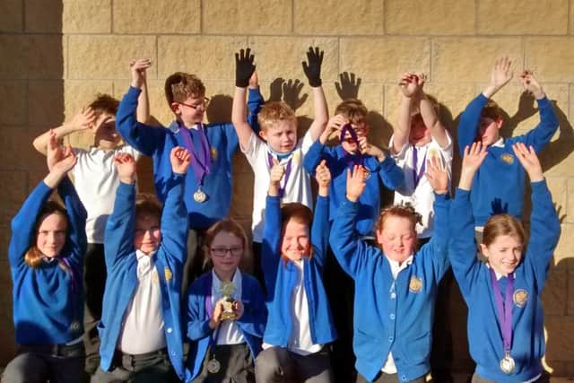St Michael's School Year 3 and 4 swimming team EMN-160126-084610002