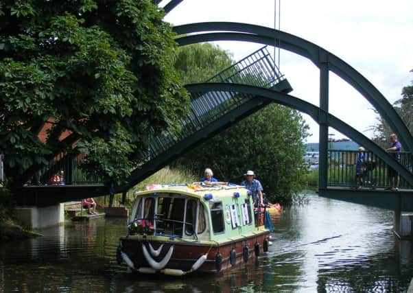 The grand opening of the lifting bridge over the River Slea in 2010 served as a perfect demonstration of how the river trip boat might work, as being suggested again now. EMN-160202-112145001