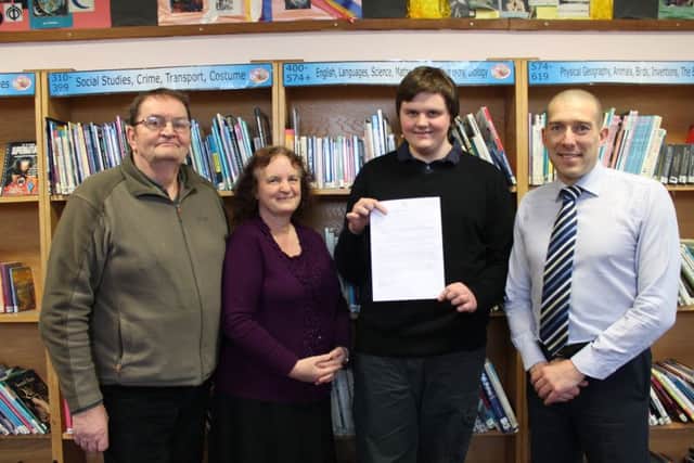 Cameron Marnoch with his parents, Doug and Kate, and Cordeaux's Assistant Vice Principal Stewart West.