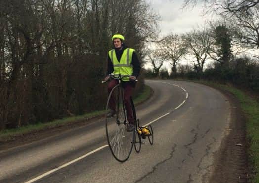Robert Steadman on his penny farthing replica bicycle. ANL-160402-155552001