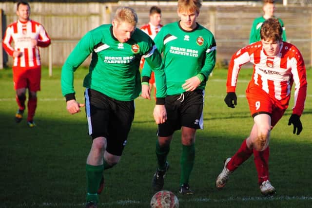 Action from Horncastle Town's defeat at Sleaford Town Reserves on Saturday. Photo: John Burgess
