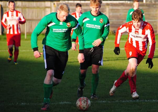 Action from Horncastle Town's defeat at Sleaford Town Reserves on Saturday. Photo: John Burgess