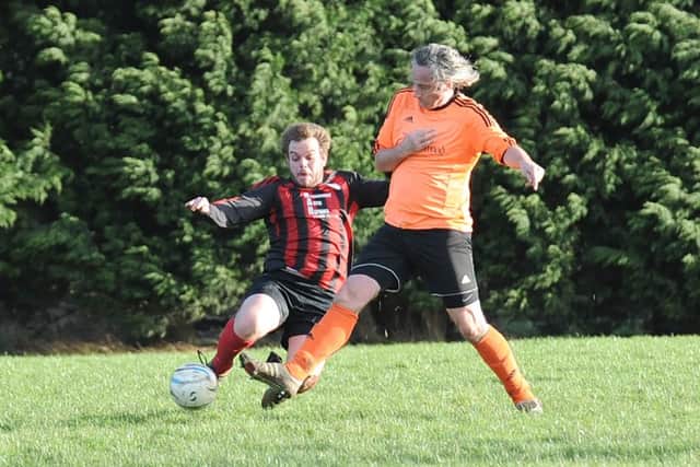 Marv Jolly battles with Chris Hall.