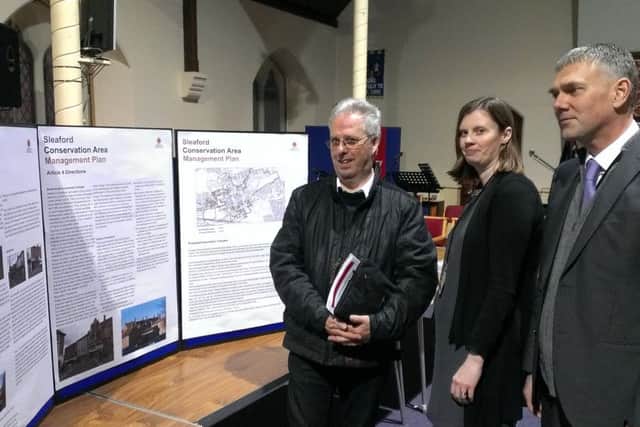 Considering plans for change to the conservation area of Sleaford town centre and benfits to business property owners. from left - interested resident Keith Maltby, conservation officer Marianna Porter and NKDC Head of Planning Andrew McDonough. EMN-160902-150919001