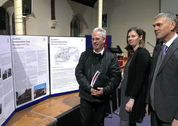 Considering plans for change to the conservation area of Sleaford town centre and benfits to business property owners. from left - interested resident Keith Maltby, conservation officer Marianna Porter and NKDC Head of Planning Andrew McDonough. EMN-160902-150919001