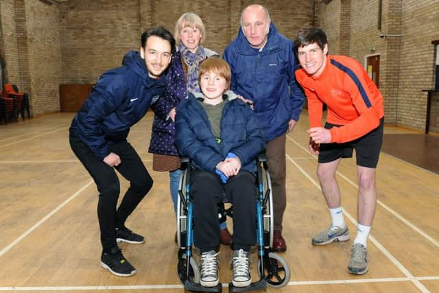 DAn Taylor and Marc Hitwell of Discovery Sports, are running Lincoln 10k to raise money for Joe Fulwood. L-R Dan Taylor - founder of Discovery Sports, Marlene Fulwood, Joe Fulwood 12, Joe Fulwood, Marc Hipwell - sports coach at Discovery Sports.