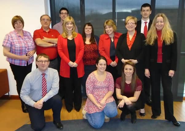 Caption: Staff at the Boston office of chartered accountants Duncan & Toplis joined in on Wear It Red day in aid of the British Heart Foundation. In total, the firm raised Â£350.