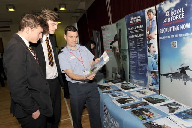 Chambers Career Fair at Boston Grammar School. L-R William Parsons 15 and Connor Goodfellow 16 with Corporal Dave Tuffnail - Aircraft Engineer and Careers Adviser.