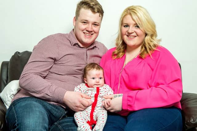 Laim, Jade and baby Poppy-Rae
Baby love heart birth mark
Skegness Lincolnshire ANL-160215-124533001