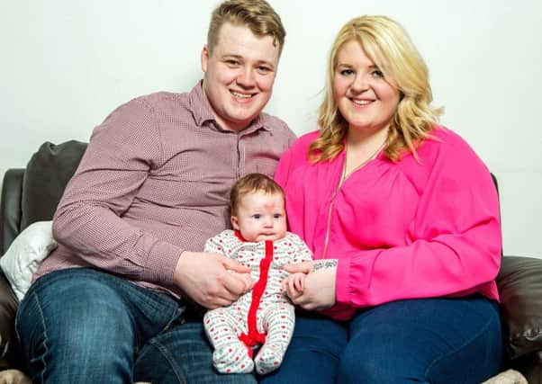 Laim, Jade and baby Poppy-Rae
Baby love heart birth mark
Skegness Lincolnshire ANL-160215-124533001