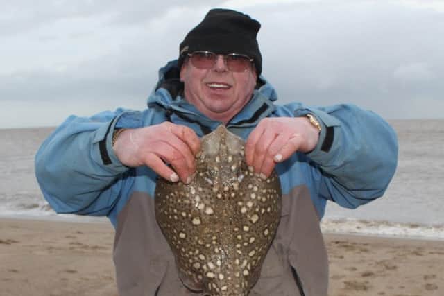 Dave Burr with his ray.