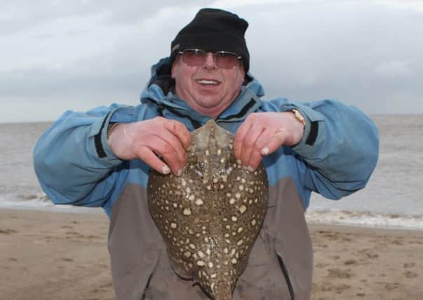 Dave Burr with his ray.