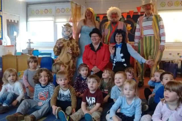 Children at Jacdor enjoying a visit from ther Lions pantomime cast EMN-160802-122956001