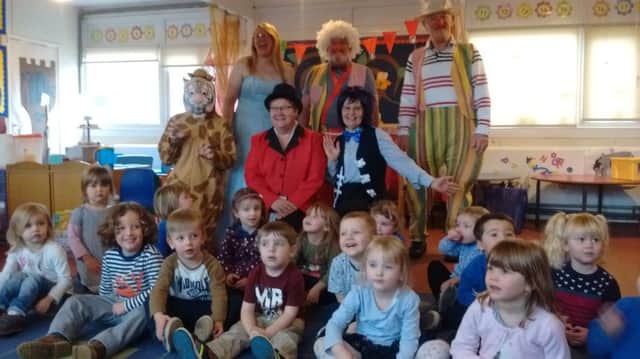 Children at Jacdor enjoying a visit from ther Lions pantomime cast EMN-160802-122956001