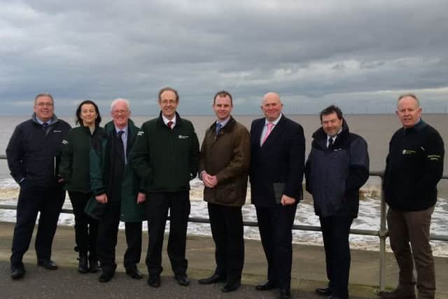 Peter Bateson (IDB), Deborah Campbell (EA), Phil Younge (EA area manager), Sir James Bevan, Matt Warman MP, Coun Colin Davie, Eddy Poll (RFCC) and Mark Robinson (EA) in Ingoldmells. ANL-160802-145433001
