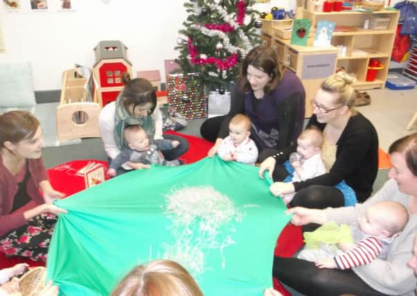 During one of the regular sessions for parents and babies at Caythorpe and Ancaster Childrens Centre. EMN-160802-174915001