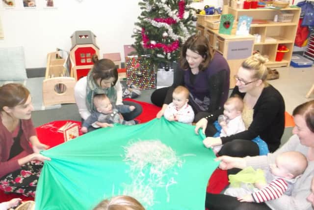 During one of the regular sessions for parents and babies at Caythorpe and Ancaster Childrens Centre. EMN-160802-174915001