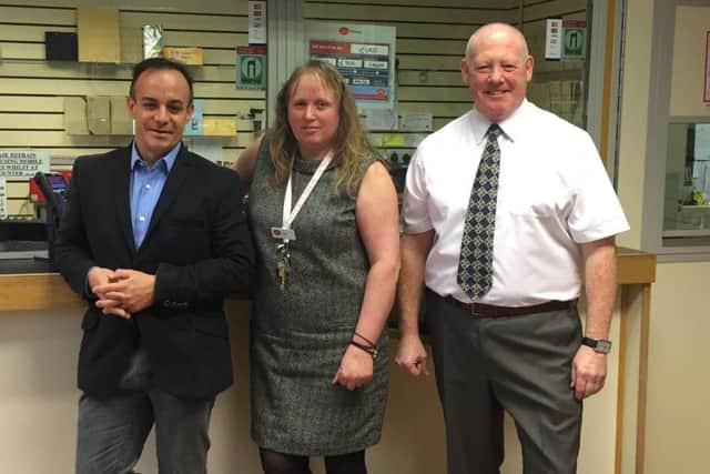 Stephen Phillips with the staff running Sleaford's town centre Post Office. EMN-161202-171746001