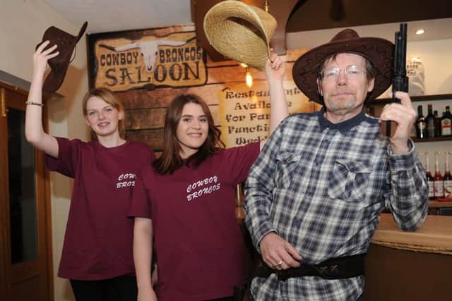 Opening night for new restaurant in Sleaford, Cowboy Broncos. L-R Paige Reed, Paige Hirst and owner Andrew Parks. EMN-160214-102655001
