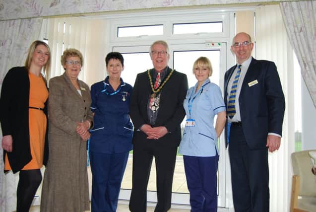 Deputy Mayor of Skegness Coun Dick Edgington (centre) at the hospice.