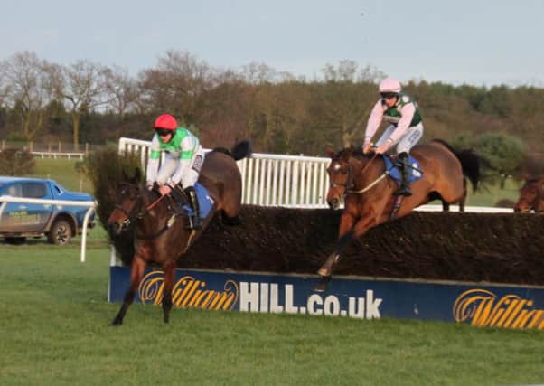 Ballydeen and jockey James Banks lead Ivans Backand Gavin Sheehan in the fifth race at Market Rasen EMN-161002-172035002