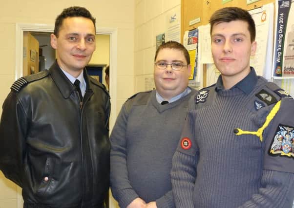 Gp Capt Sanger-Davies, left, with Flt Lt Blackman and Cadet Sgt Liam
Davies.