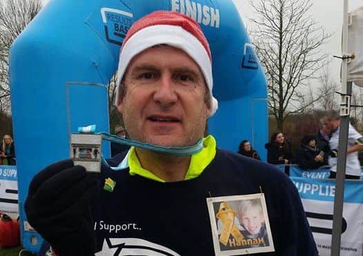 Simon after completing his 13th half marathon
