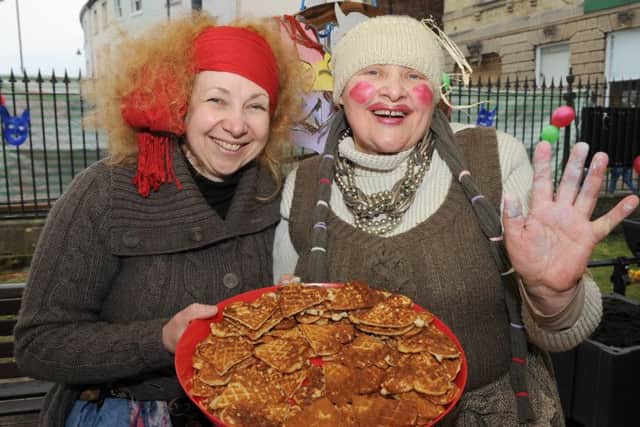 Lithuanian traditional Pancakes Day Together event. L-R Snieguole Milkunaite and her mother Salomeja Milkuniene with pancakes.