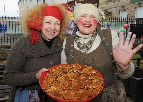 Lithuanian traditional Pancakes Day Together event. L-R Snieguole Milkunaite and her mother Salomeja Milkuniene with pancakes.