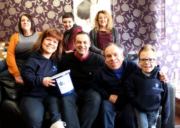 Film and TV star Warwick Davis was in Louth this morning with his family to support local Man Richard Bannister (centre) who is running the London Marathon for the charity they cofounded, Little People UK.