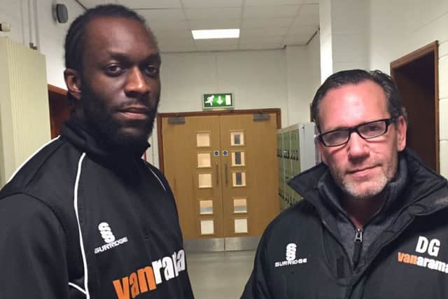 Stephane Ngamvoulou with Dennis Greene.