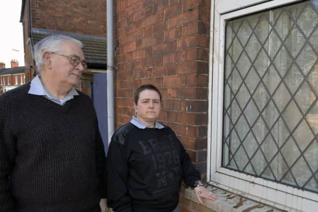 Roger and Jackie Featherstone outside their home. Mr Allman was too unwell to take part in the photograph.