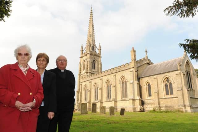 Raising the roof with parishioners at St Andrews Church in Sausthorpe are (from left) Sylvia Bell, retired church warden, Jean Ianson, treasurer, and Canon Peter Coates. ANL-160216-112946001