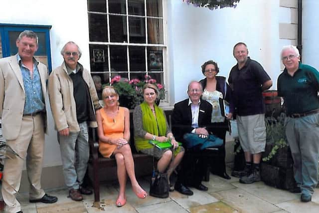 Caistor in Bloom committee with East Midlands In Bloom judges EMN-160223-150058001