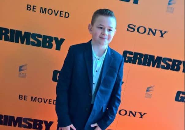 Freddie Crowder on the red carpet at the Grimsby premiere EMN-160229-115327001