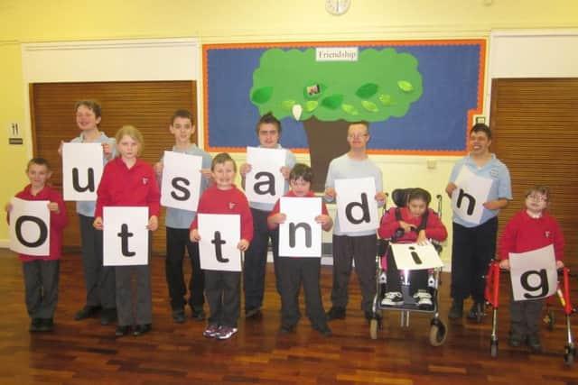 Pupils at Eresby School in Spilsby celebrate their outstanding rating from Ofsted.
