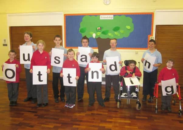 Pupils at Eresby School in Spilsby celebrate their outstanding rating from Ofsted.