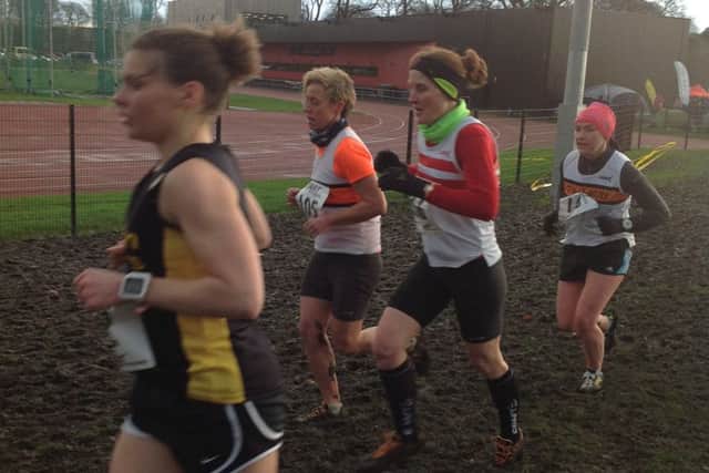Kerry Stainton (second right) at the Northern Cross Country Championships EMN-160222-103125002