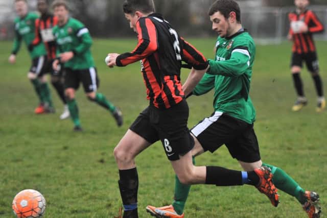 Action from Sleaford Town Reserves' 1-1 draw at Skegness United. Photo: Nigel West