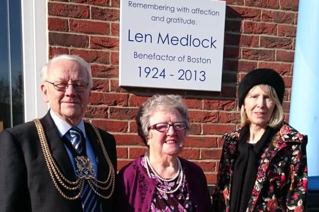 Len Medlock's sister Margaret Sampson at the plaque unveiling - pictured with Boston Mayor Coun Richard Austin and Jayne Morris, chairman of the Boston Volunteer Centre charity of trustees.