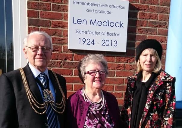 Len Medlock's sister Margaret Sampson at the plaque unveiling - pictured with Boston Mayor Coun Richard Austin and Jayne Morris, chairman of the Boston Volunteer Centre charity of trustees.