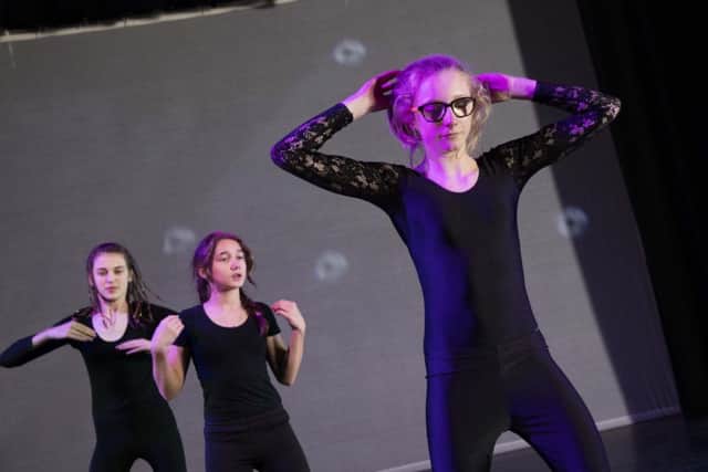 Parris Downham (left), Heather Ludlam and Danielle Taylor (front) of Explosion, Long Sutton. Photo by Electric Egg.