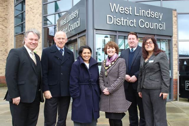 Employment Minister Priti Patel , centre left, with Director of Resources Ian Knowles; Coun Jeff Summers leader of West Lindsey District Council; Chairman of West Lindsey District Council Coun Angela Lawrence; Coun Giles McNeill and
Chief Executive of West Lindsey District Council, Manjeet Gill EMN-160403-161118001
